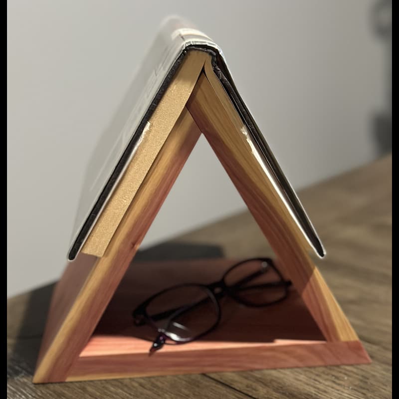 Triangular cedar book holder, minimalist bedside stand