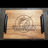 Ambrosia maple charcuterie board with detailed logo engraving